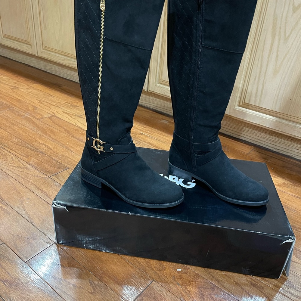 Beautiful knee high Guess boots.